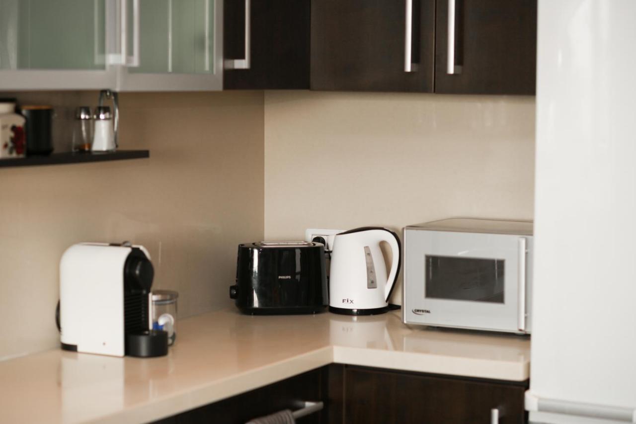 Kitchen counter with coffee machine and microwave