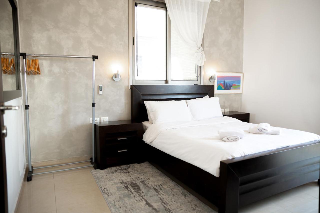 Bedroom with double bed at Sea View Apartment Prime Location